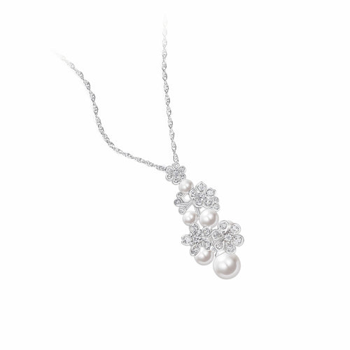 side view of Floral design silver pearl necklace with moissanites