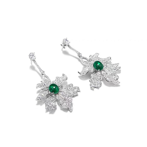 side view of Oval emerald drop earrings in silver 