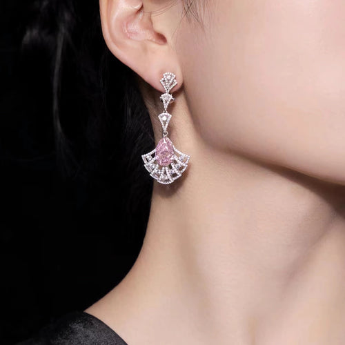 lady wearing Pink cubic zirconia earrings in silver