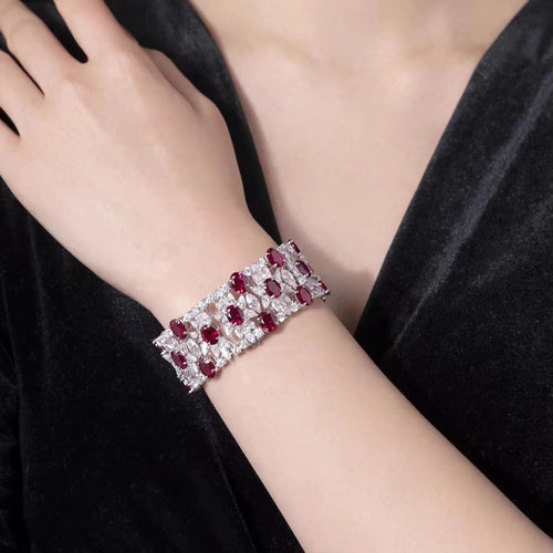 lady wearing Red oval zircon silvere bracelet  