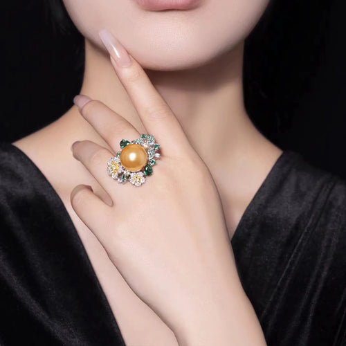 lady wearing Yellow pearl cocktail engagement ring in silver