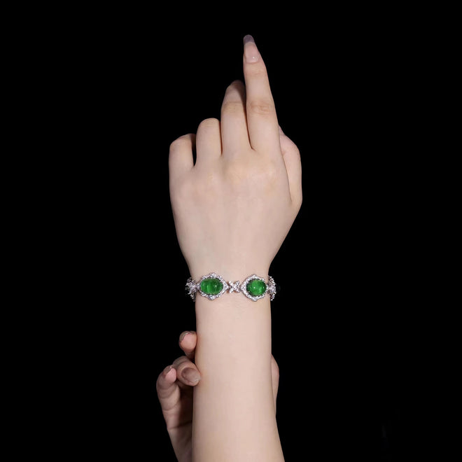 lady wearing Cabuchon emerald bracelet in silver