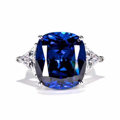 front view of Three stone blue zircon engagement ring 