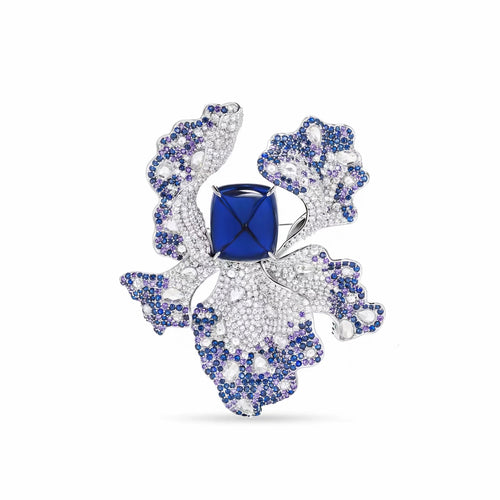 front view of Blue sapphire brooch with fancy color pavé