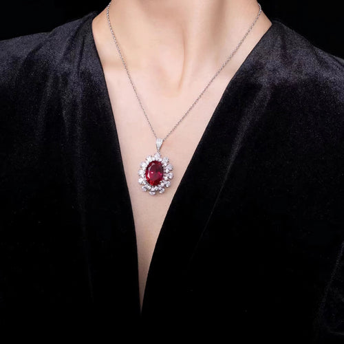 lady wearing Red oval zircon halo necklace in silver