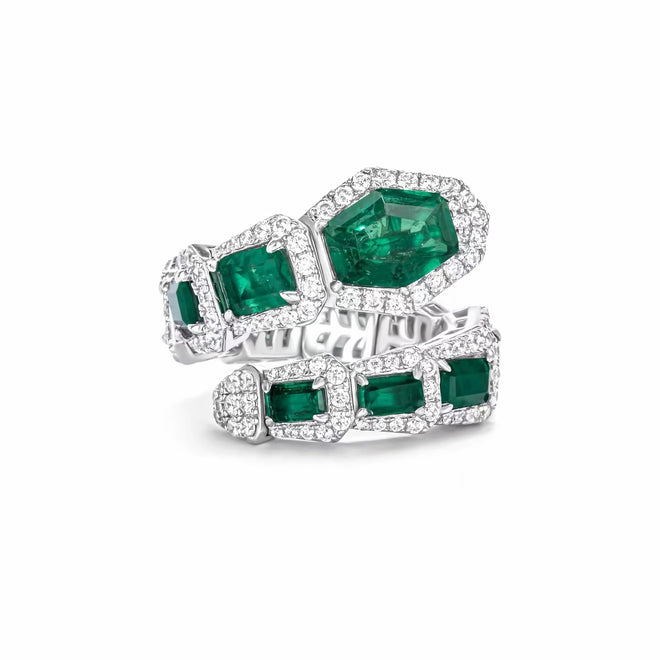 Green zircon ring in snake design