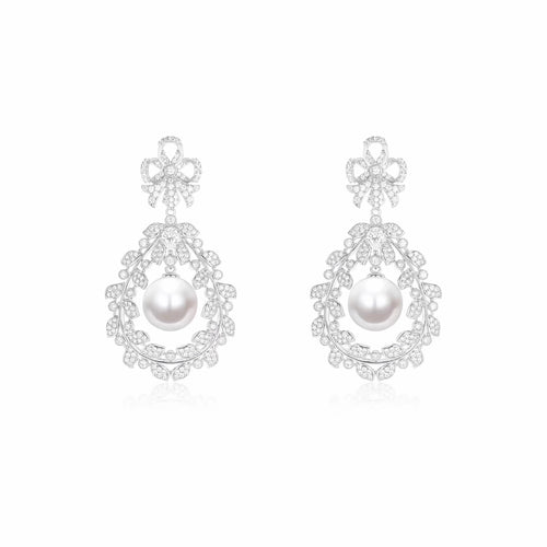 Pearl drop earrings in floral design