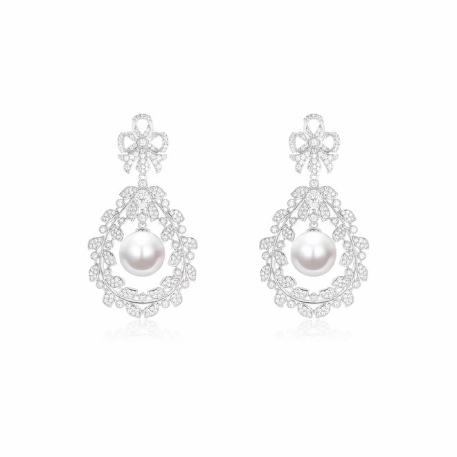 Pearl drop earrings in floral design