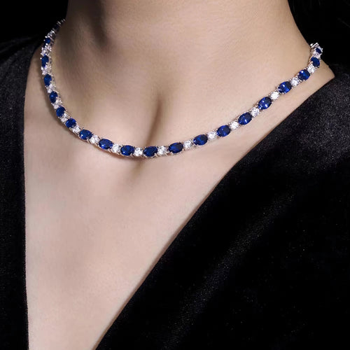 lady wearing Blue cubic zirconia alternating necklace in silver