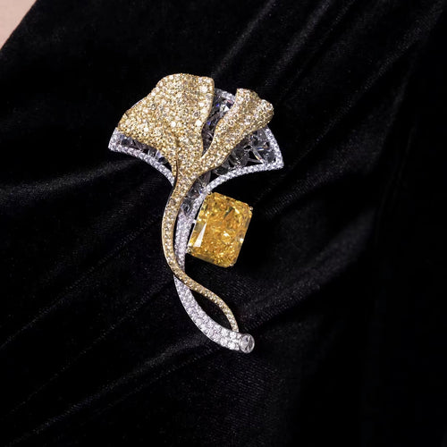 lady  wearing Radiant yellow zircon fancy brooch in silver