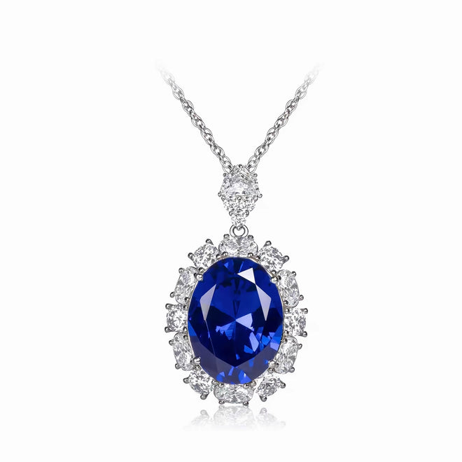 Blue cubic zirconia halo necklace in silver