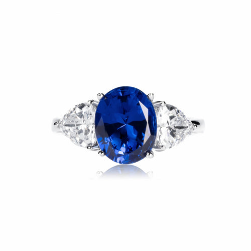 front view of Created blue sapphire ring with moissanites