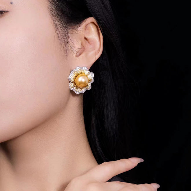 lady wearing Golden pearl floral stud earrings