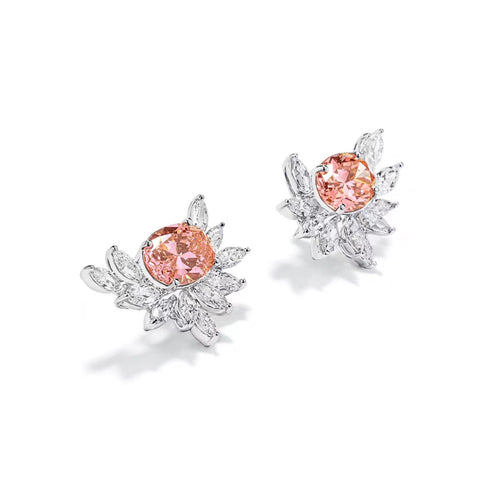 side view of Oval orange zircons earrings with marquise pavé