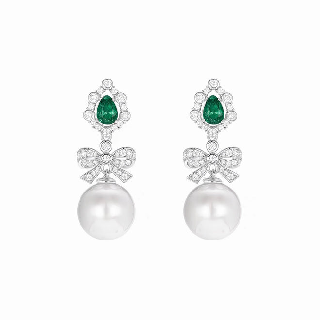 Created pearl drop earrings with emerald in silver