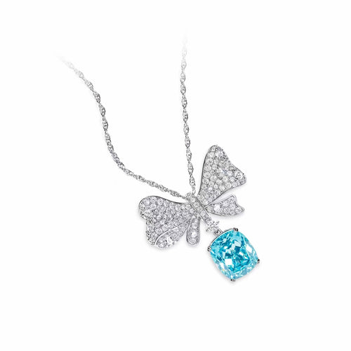 side view of Ocean blue cubic zirconia butterfly necklace in silver