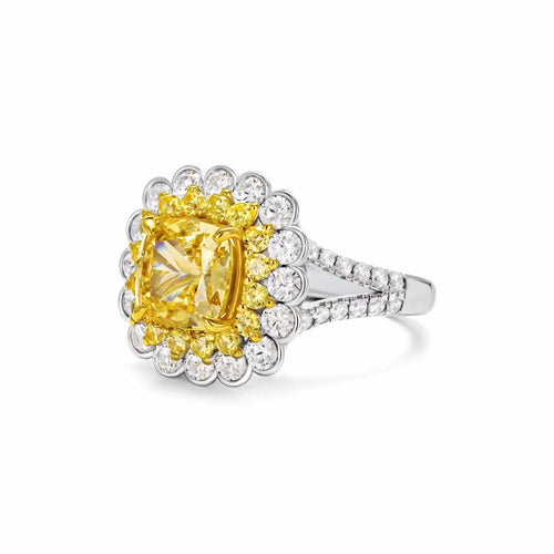 side view of Yellow zircon halo engagement ring in silver