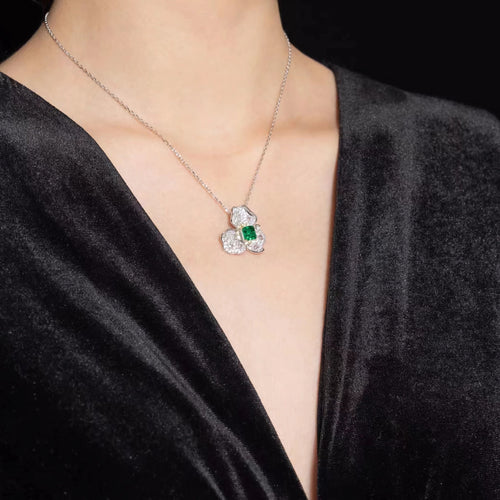 lady wearing Leafy green cubic zirconia necklace in silver