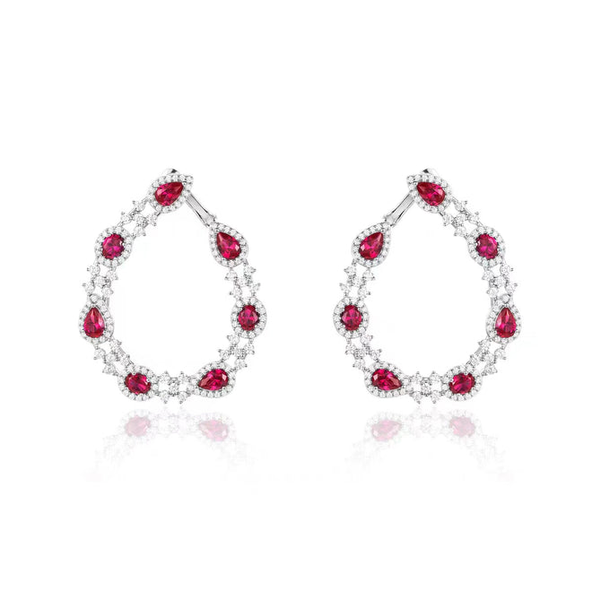 Red cubic zirconia halo hoop earrings in silver