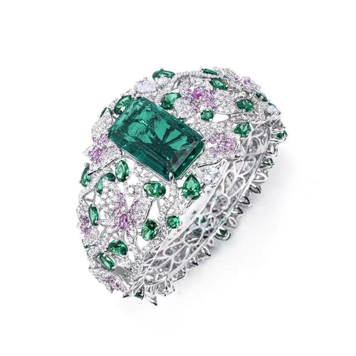 side view of Fancy emerald bangle with moissanites in silver 