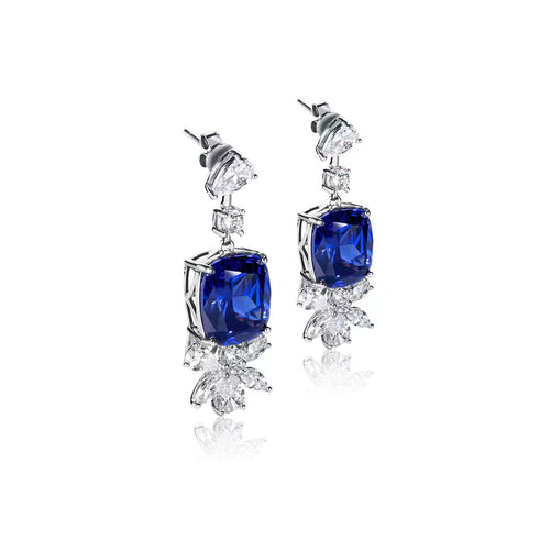 side view of Cushion blue zircon silver dangling earrings