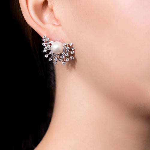 Pearl earrings with scattered pavé