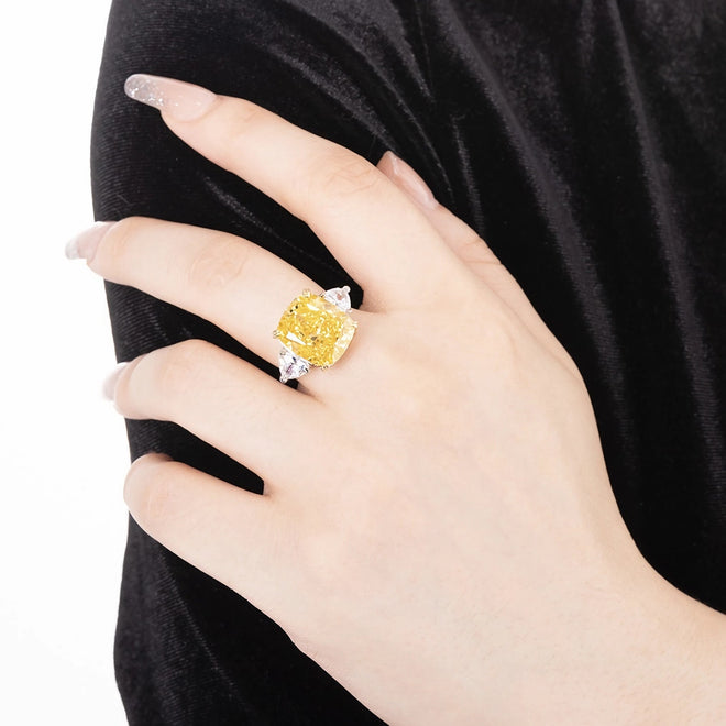 lady wearing  Three stone yellow zircon silver engagement ring