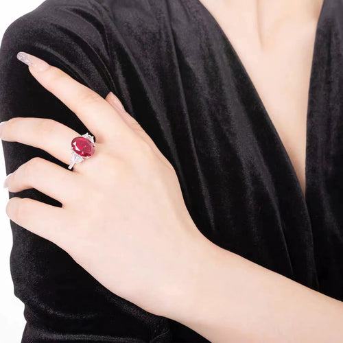 lady wearing Three-stone zircon engagement ring in silver