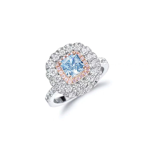 Blue zircon statement ring with pink and white halos