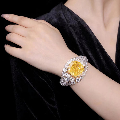 lady wearing Yellow cushion zircon fancy bracelet